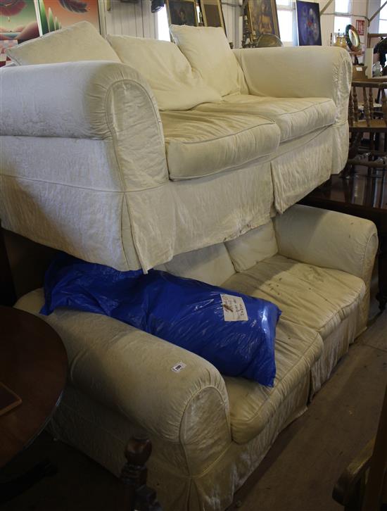 Pair of cream linen sofas(-)